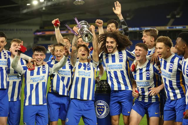 Brighton & Hove Albion under-23 lift the Sussex Senior Cup after beating Worthing 4-2 in the final in May. Picture by Martin Denyer