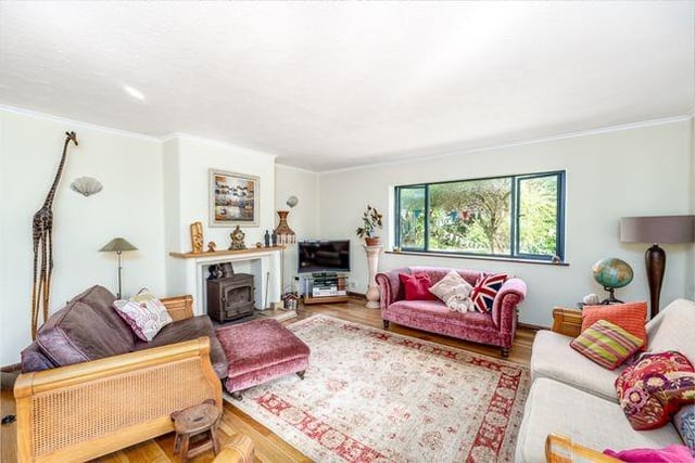 The property has a triple aspect sitting room, with dual fuel wood burner.