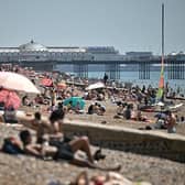 Today (August 11) government officials have issued an amber health warning for the South East till Friday.  This comes after temperatures are set to reach mid-30s across the county this week.(Photo by Ben STANSALL / AFP via Getty Images)