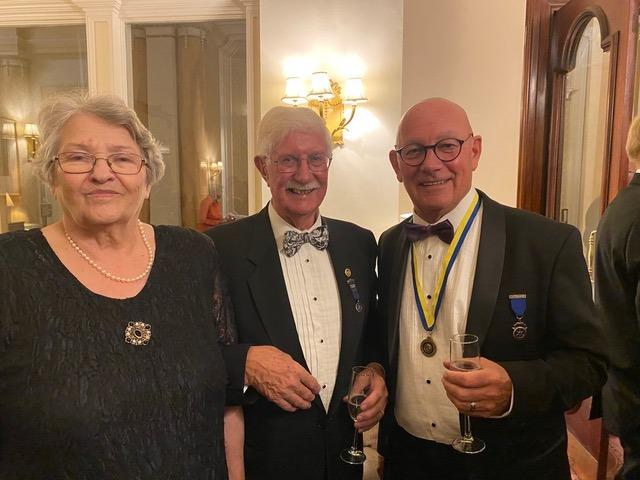 Rotarian Chris Smith and his wife with former club president, Nigel Greaves.