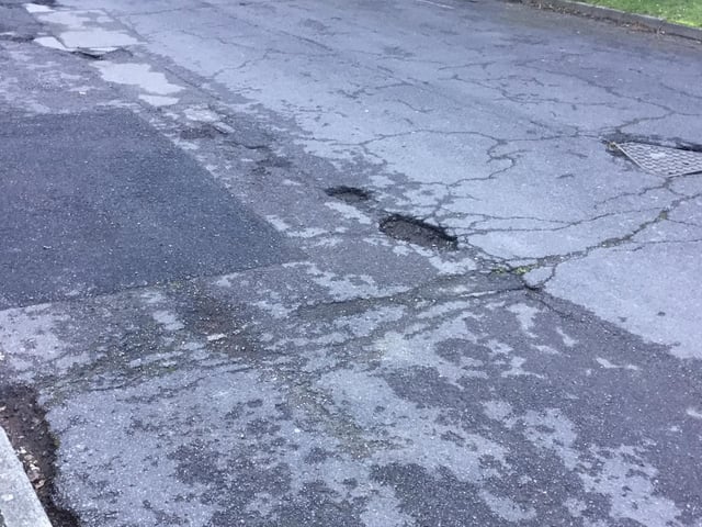 Potholes in Broomfield Drive, Billingshurst