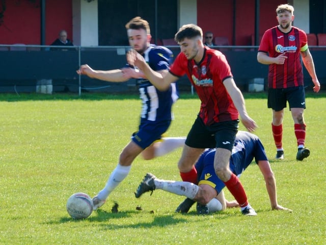 Action from Wick's home defeat to Godalming in the SCFL Division 1 at Crabtree Park