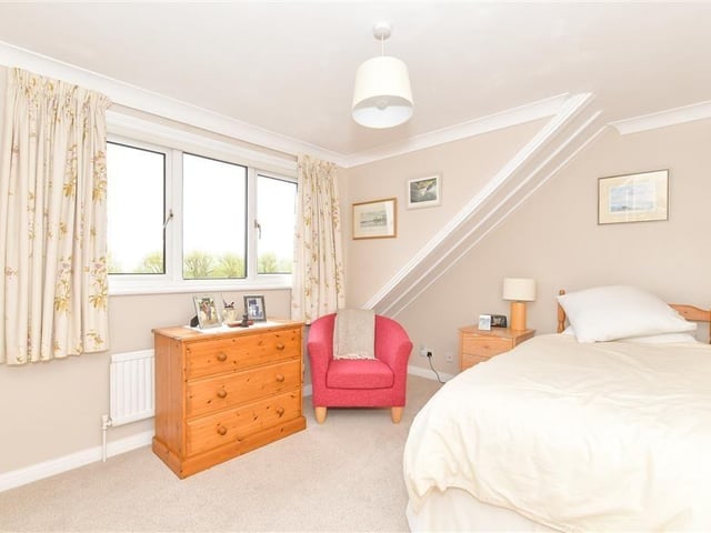 This modern town house with waterside garden is tucked away on a desirable private development in the heart of Arundel. It comes to the market with Cubitt & West, priced at £700,000.