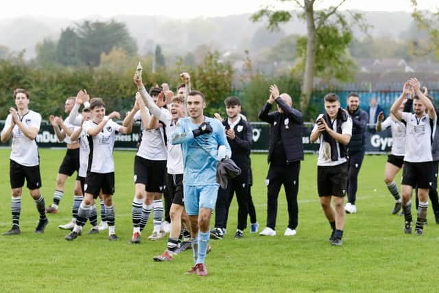 Bexhill United players go to their fans after their FA Vase victory at Horndean | Picture: Joe Knight