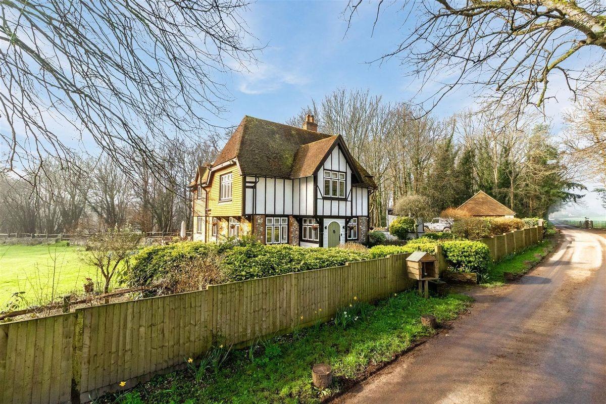 This traditional character cottage has been doubled in size and comes on the market with approximately one acre of private grounds