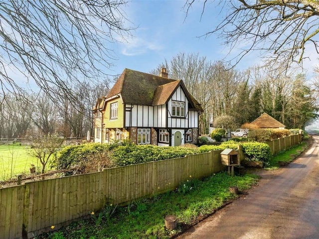 This traditional character cottage has been doubled in size and comes on the market with approximately one acre of private grounds
