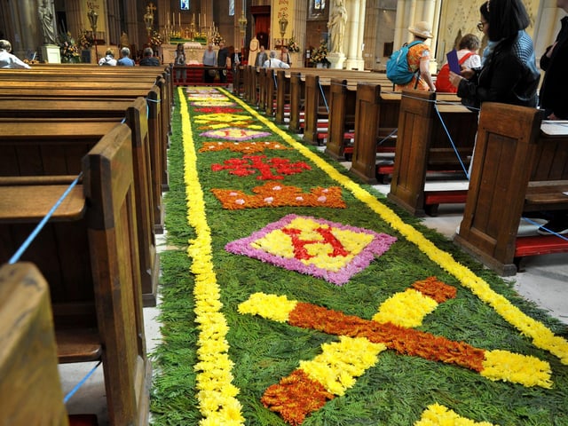 Arundel Cathedral is celebrating the feast of Corpus Christi with the magnificent festival of flowers which started 150 years ago, featuring a world famous Carpet of Flowers in the central aisle of the Cathedral. Pic S Robards SR2306071