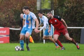 Worthing United battle against Shoreham - and the rain and wind | Picture by Stephen Goodger