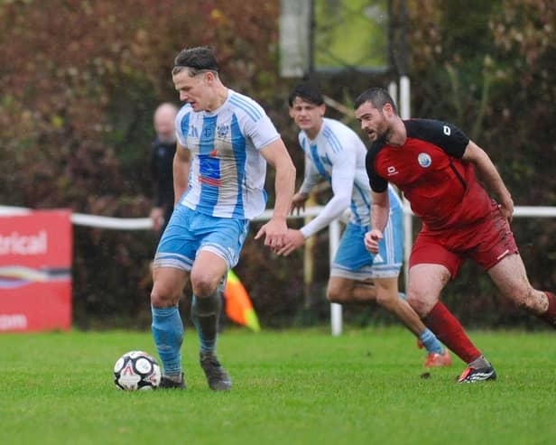 Worthing United battle against Shoreham - and the rain and wind | Picture by Stephen Goodger