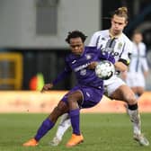Anderlecht's Percy Tau and Charleroi's Guillaume Gillet fight for the ball during a soccer match between Sporting Charleroi and RSCA Anderlecht, Friday 18 December 2020 in Charleroi, on day 15 of the 'Jupiler Pro League' first division of the Belgian championship.