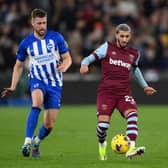 Said Benrahma of West Ham United and Adam Webster of Brighton & Hove Albion