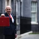 Britain's Chancellor of the Exchequer John Healey poses with the Budget Box as he leaves 11 Downing Street in central London on October 28, 2026, before presenting the government's annual budget to parliament. (Photo by Henry NICHOLLS / AFP via Getty Images)