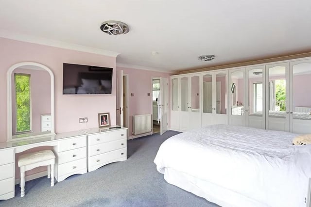 The six bedrooms include a principal bedroom with a balcony and a deluxe en suite wetroom