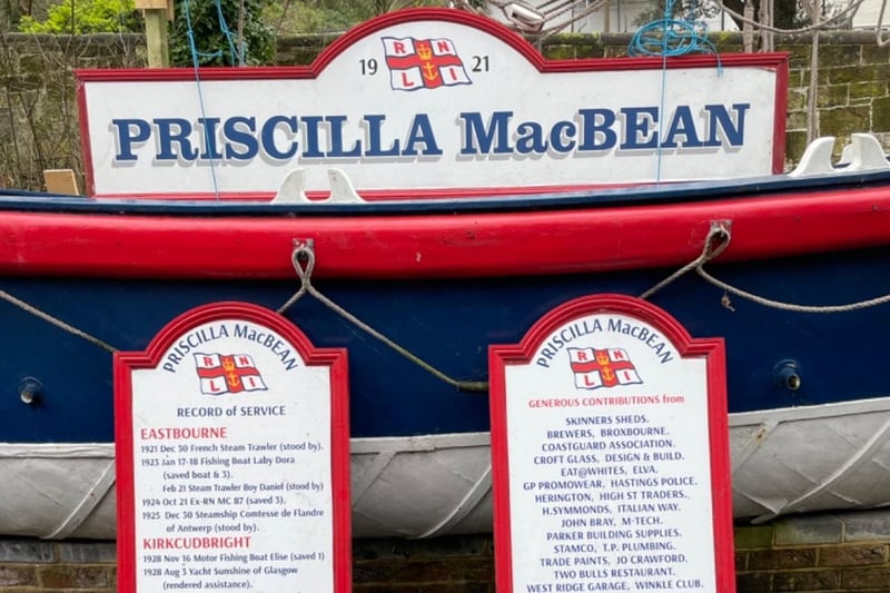 Priscilla MacBean signs