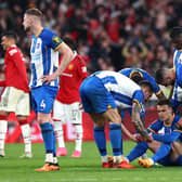 Solly March is consoled by team-mates following Brighton & Hove Albion's penalty shootout defeat to Manchester United in the FA Cup semi-finals. Picture by Clive Rose/Getty Images