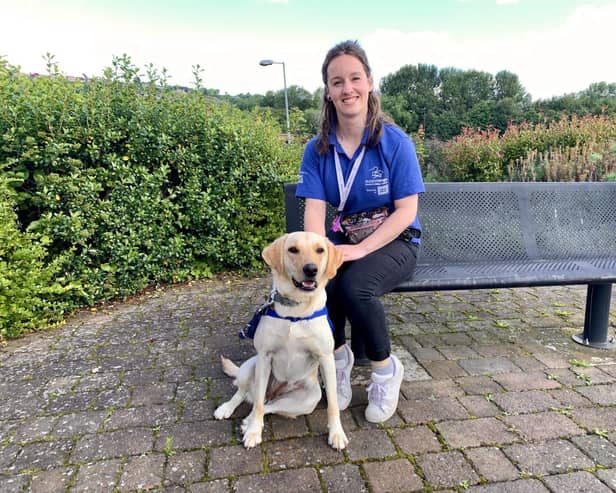Ellie Keen and trainee Support Dog Bon Bon