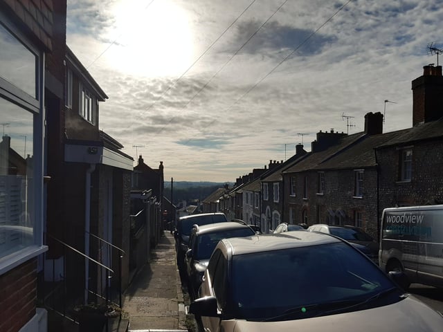 For our walk, we are turning right past St Mary's Gate Inn to go down King Street. There are some lovely views over towards Lyminster as you walk down.