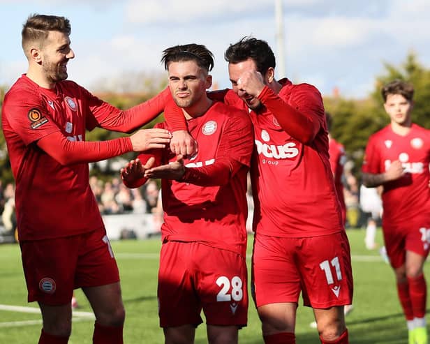 Danny Cashman - scorer of both Worthing's goals in the 2-2 draw with Bath City - is congratulated | Picture: Mike Gunn