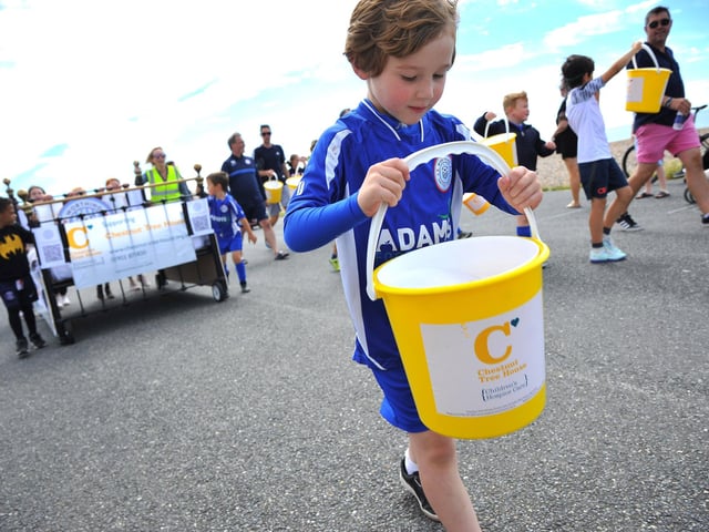 Worthing United Youth Football Club’s 30 teams took turns to push a bed along Worthing seafront to raise money for Chestnut Tree House