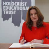 Gillian Keegan MP signs the Holocaust Educational Trust’s Book of Commitment