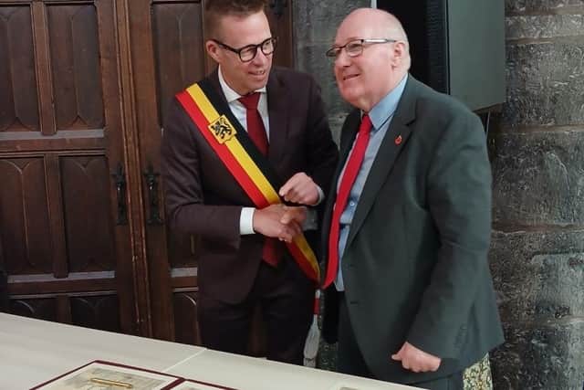 Cllr Phil Scott (right) with the Mayor of Oudenaarde