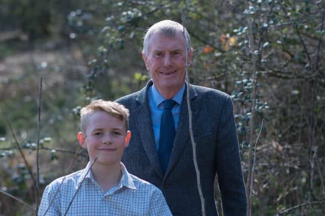 John Godfrey and grandson Ollie at Wild Heart Hill, Findon, helping to plant a Platinum Jubilee Avenue on the Monarch’s Way