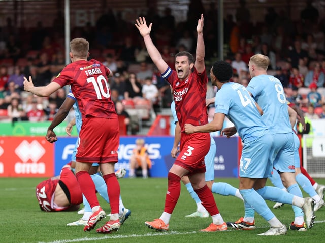 Dion Conroy successfully appeals for a penalty against Leyton Orient