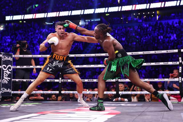 KSI (Olajide Olayinka Williams) and Tommy Fury exchange punches during the Misfits Cruiserweight fight at AO Arena in Manchester, (Photo by Matt McNulty/Getty Images)