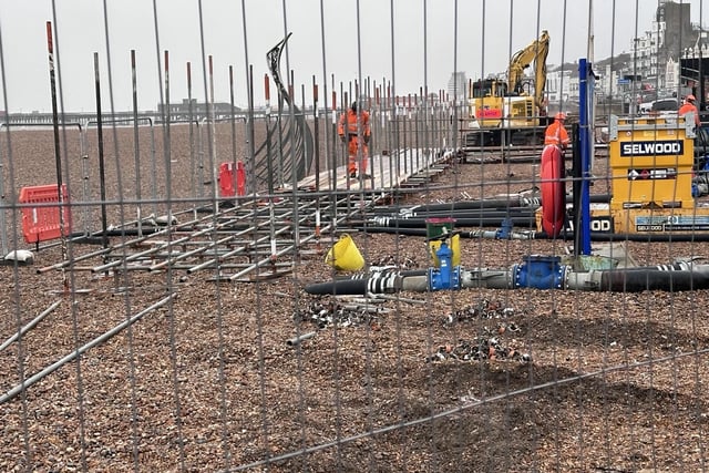 The temporary pumps and scaffolding on the beach