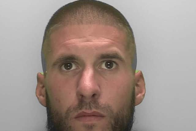 Police are continuing to search for Bradley Moynes, who is wanted in connection with an attack involving a suspected noxious substance in Eastbourne.