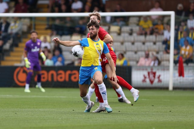 Action from Worthing's 3-0 win at Torquay United which put them top of National League South