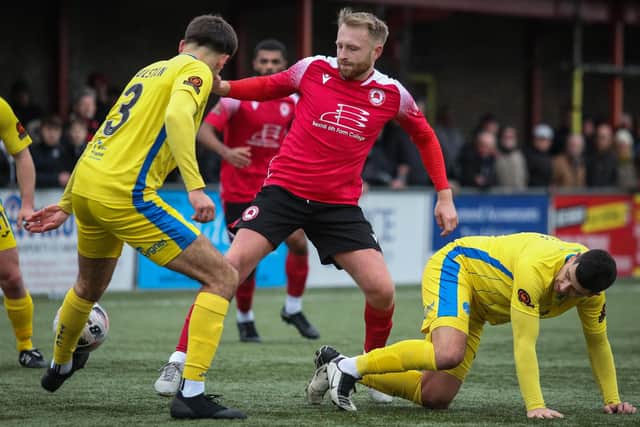 James Hammond in the thick of the action for Eastbourne Borough against Taunton | Picture: Andy Pelling