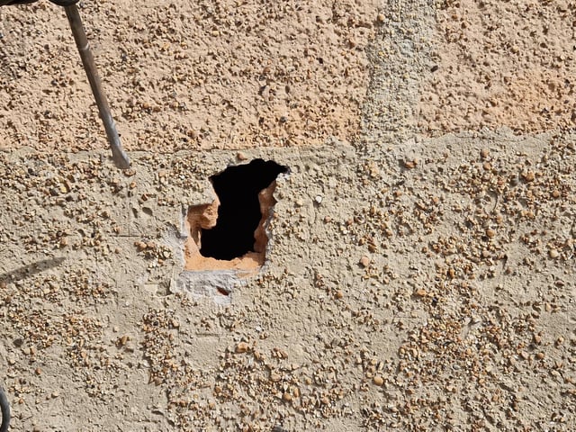 Pete Coe, one of the project leaders, and fellow former Royal Engineer Graham Cosham worked together to open the southern embrasure at the Ferring pillbox