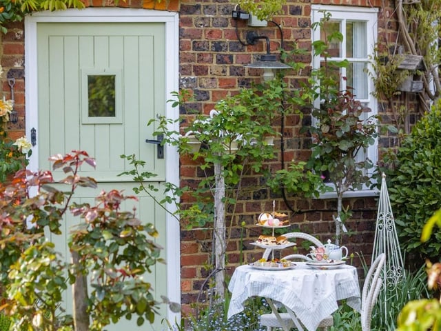 "Allow the verdant surrounds to soothe your soul; the approach to The Old Oast is celebrated in a cascade of colour from the mature magnolia, camelia bushes heavy with blossom and climbing roses festooning the front of the home. Birdsong provides the soundtrack to your arrival."
