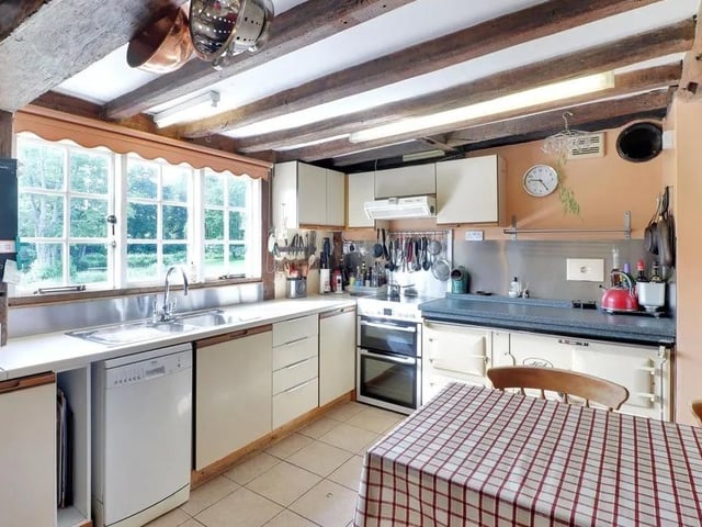 The kitchen/breakfast room has a four oven solid fuel Aga and space for a table and chairs