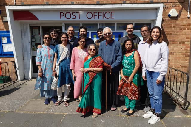 Alka Sthankiya and her in-laws, Jyotibhai and Indumati Sthankiya, centre, with their family outside Mansell Road Post Office on her last day