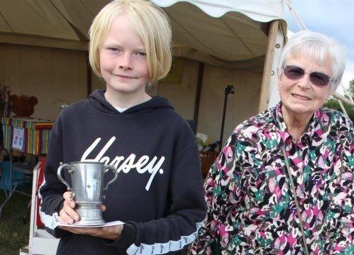 Ted Coomber, 11, won the Teens’ Trophy and took on the adults to win the Binns Trophy for best vegetable, a dish of culinary peas