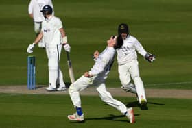 Jack Carson celebrates after dismissing Joe Root in a county championship game (Photo by Mike Hewitt/Getty Images)