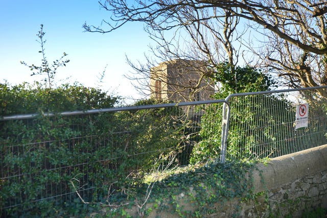 Unstable land off West Hill Road, St Leonards. The top of St Leonards Parish Church can be seen in the picture.