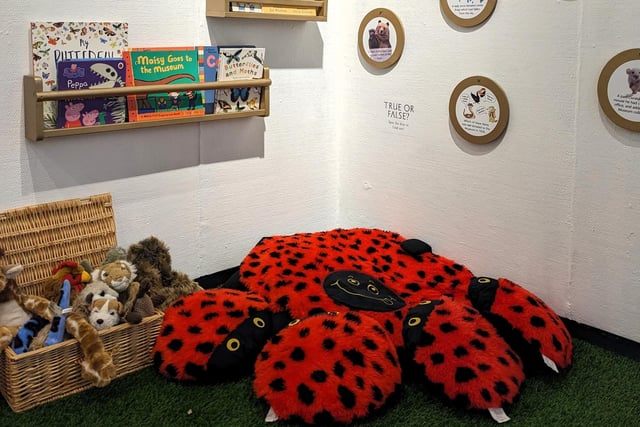 Take a seat in the cosy ladybird reading area