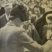 Princess Elizabeth paid a £1 note for an NSPCC flag when she arrived at Worthing Town Hall on Saturday, May 19, 1951
