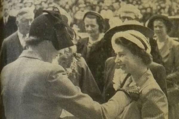 Princess Elizabeth paid a £1 note for an NSPCC flag when she arrived at Worthing Town Hall on Saturday, May 19, 1951