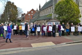 Mothers’ Union members and family from several local churches gathered for the minute’s silence to raise awareness about violence against women. Picture from Sue Lockhart