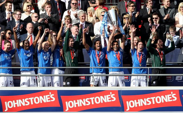 LONDON, ENGLAND - MARCH 25:  The Chesterfield team celebrate during the Johnstone's Paint trophy Final between Swindon Town and Chesterfield at Wembley Stadium on March 25, 2012 in London, England.  (Photo by Scott Heavey/Getty Images)