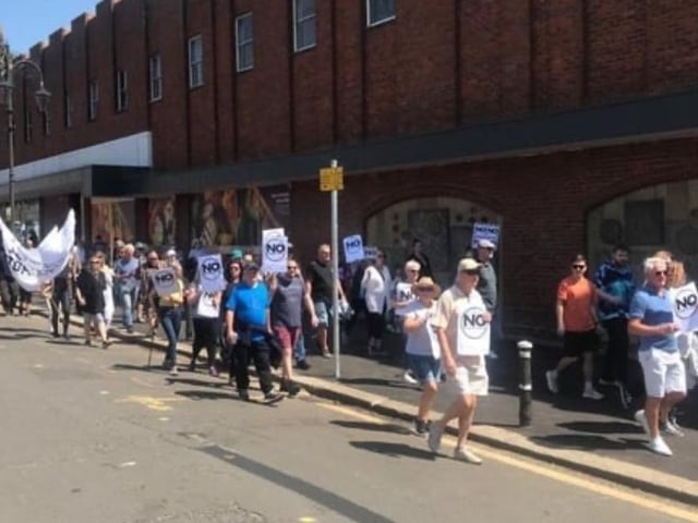 Protest march against proposed asylum seeker centre