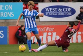 West Ham's Estelle Cascarino (right) challenges Brighton's Kiko Seike (left) for possession | Ella Linscott