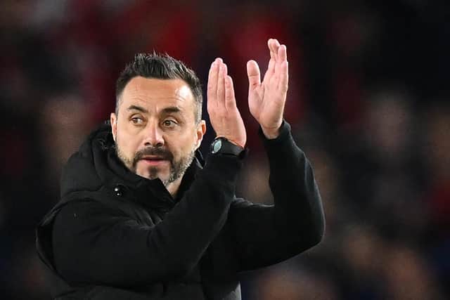 Manchester City boss Pep Guardiola has heaped praise on Brighton & Hove Albion head coach Roberto De Zerbi ahead of Saturday's Premier League clash between the two sides. Picture by GLYN KIRK/AFP via Getty Images