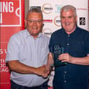 Hornets chairman Kevin Borrett accepts the Team Performance trophy on behalf of the club from sponsors Shepherd Neame | Picture via Horsham FC website