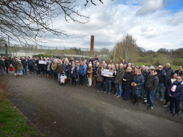 Public gathering by the gates of the Northeye site in Bexhill on Saturday April 1.