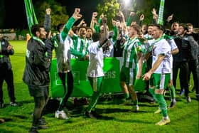 Chichester City lift the promotion play-off trophy | Picture: Neil Holmes